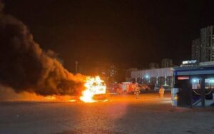 A bus goes up in flames after an explosion at a parking lot in Bat Yam, February 20, 2025.