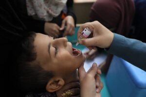 A Palestinian child receives a polio vaccination as a part of the second phase of the polio vaccination program, Gaza City, on November 02, 2024 

