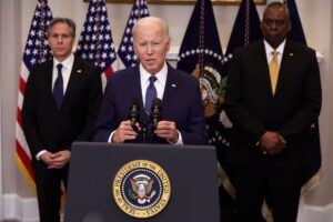 President Joe Biden (C), Secretary of State Antony Blinken (L), and Defense Secretary Lloyd Austin (R)