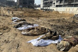 The bodies of 20 Palestinians, killed during Israeli raids on Sheikh Zayed in northern Gaza, are seen after being exhumed from a mass grave on February 2, 2025.