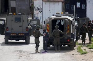 The Israeli army raids Askar al-Qadim and Askar al-Jadid refugee camps, arresting a number of Palestinians in Nablus, West Bank on March 18, 2025