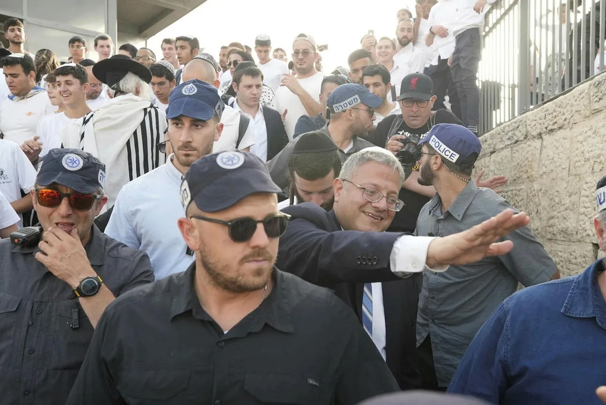 National Security Minister Itamar Ben-Gvir in the Old City, yesterday. As he entered under heavy police protection, dozens of youths around him shouted "Death to Arabs."