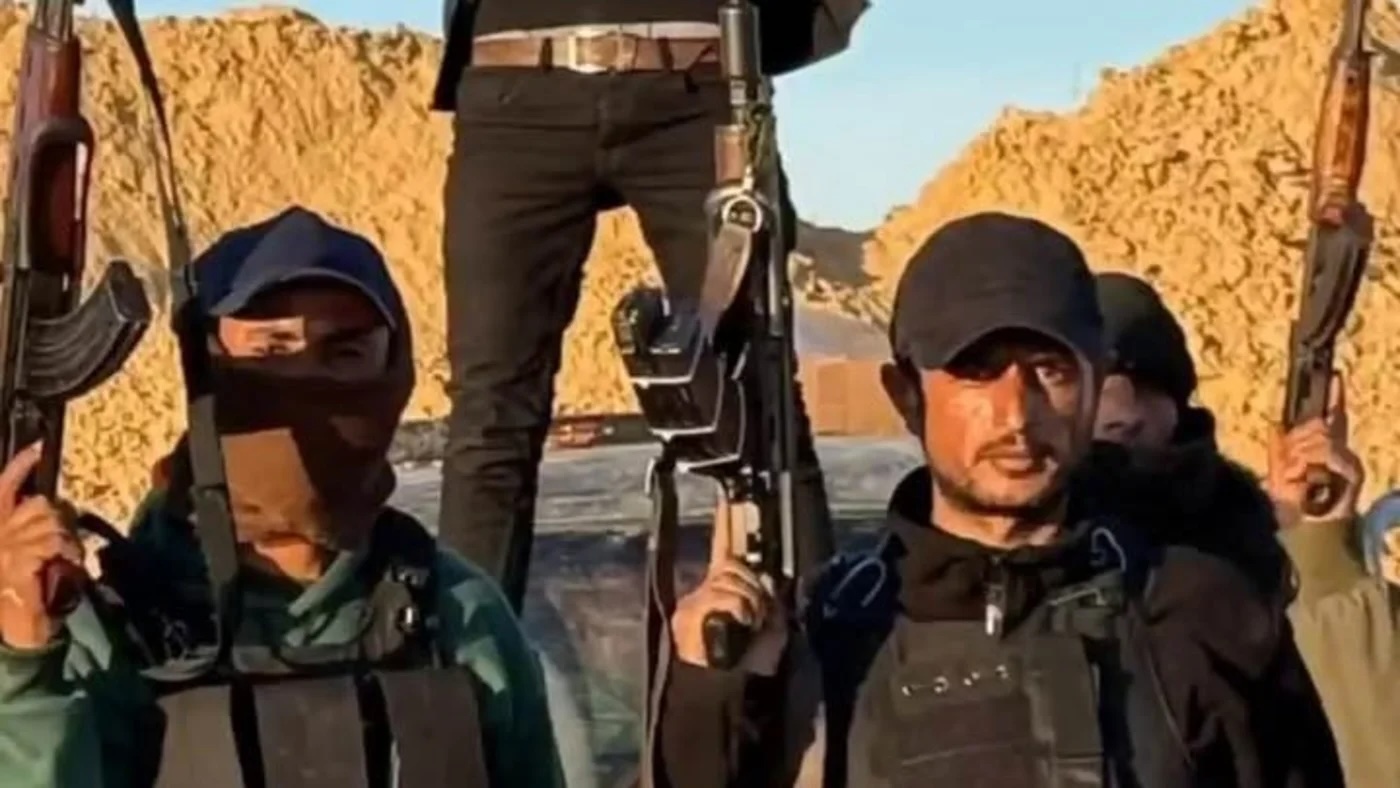 Members of the Abu Shabab gang in Gaza, seen in a recent video posted by the group on Facebook
