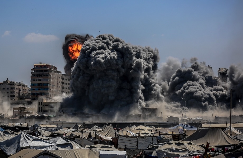 Smoke rises from the Harmony Tower, right after being bombed by Israeli forces in western Gaza City, Gaza on September 10, 2025.