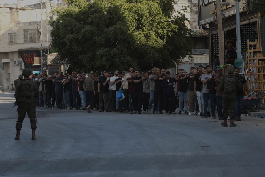 Israeli forces detain Palestinians following an explosion in Tulkarem, West Bank, on September 11, 2025.