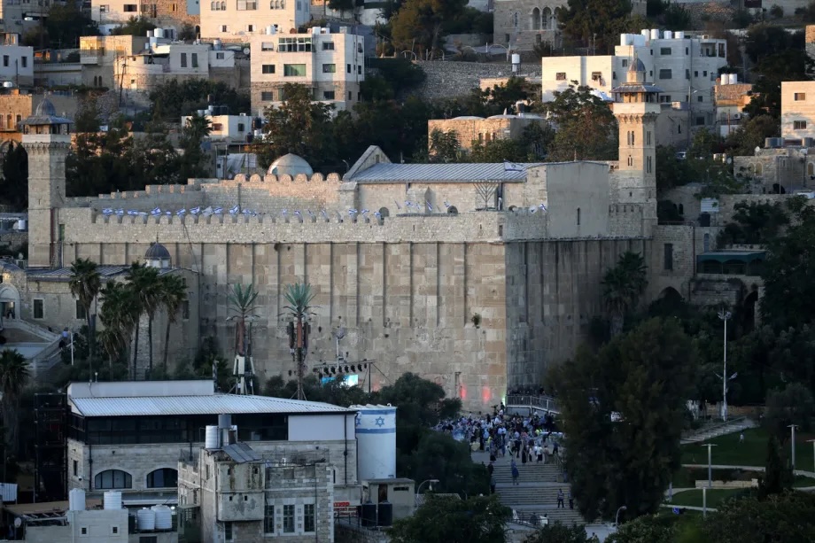 Jewish settlers, under the protection of Israeli forces, storm the Ibrahimi Mosque in the southern city of Hebron, West Bank, on September 03, 2025.