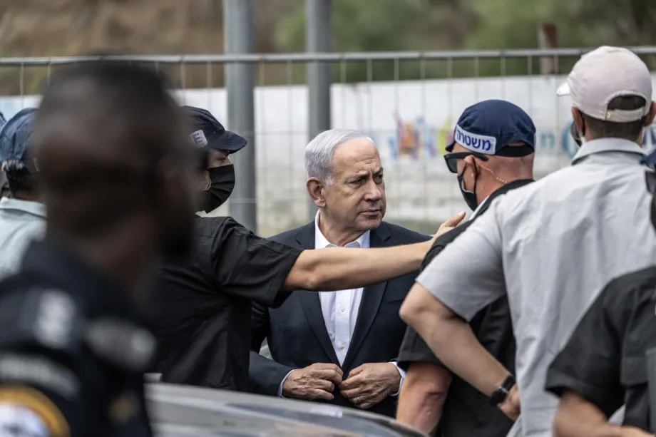 Israeli Prime Minister Benjamin Netanyahu arrives the scene after an armed attack at the Ramot Junction at the entrance to East Jerusalem on September 8, 2025.