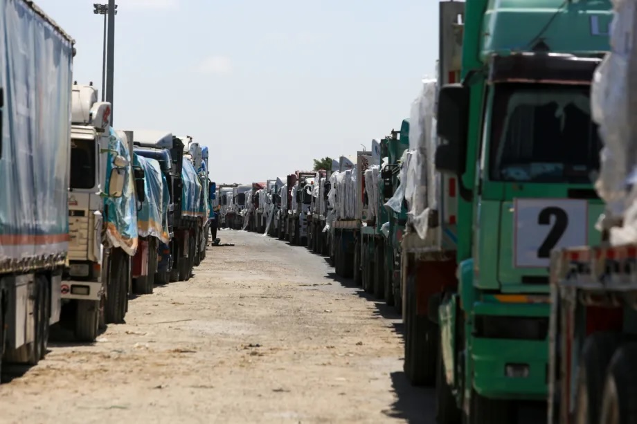 Aid trucks loaded with humanitarian supplies remain stranded at the Rafah Border Crossing, on August 6, 2025.