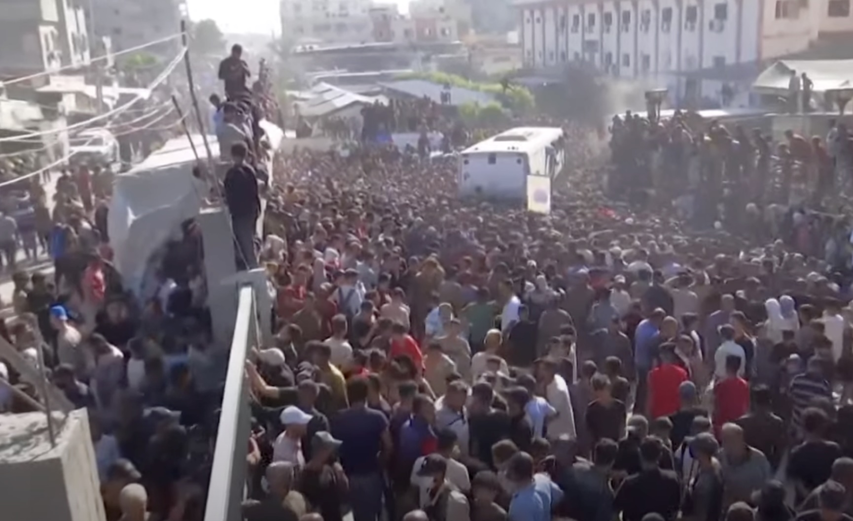 Palestinian prisoners from Israel arrive in Gaza to massive crowds.