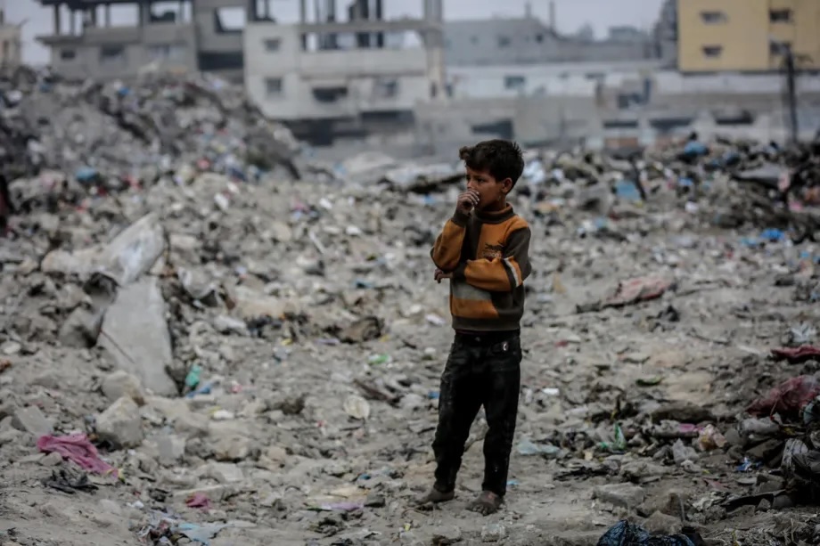 Palestinian children spend hours searching through piles of garbage to find food and basic supplies in Gaza City, Gaza on November 11, 2025.