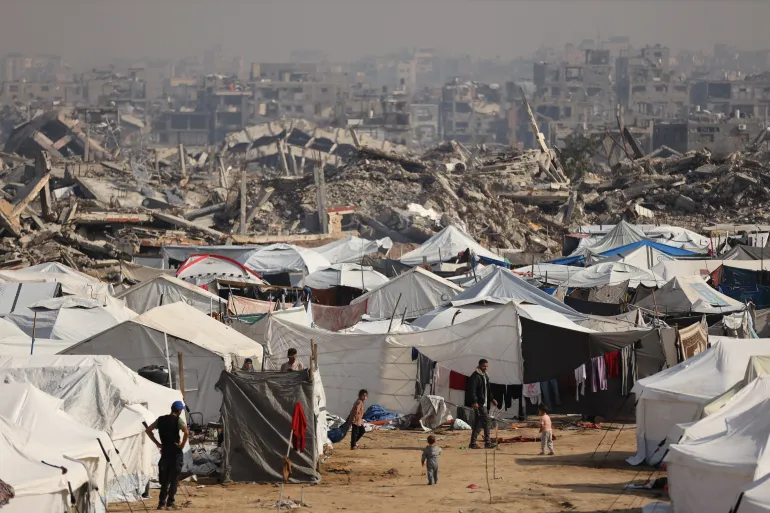Displaced Palestinians live in tents in the Zeitoun neighborhood of Gaza City on November 17, 2025
