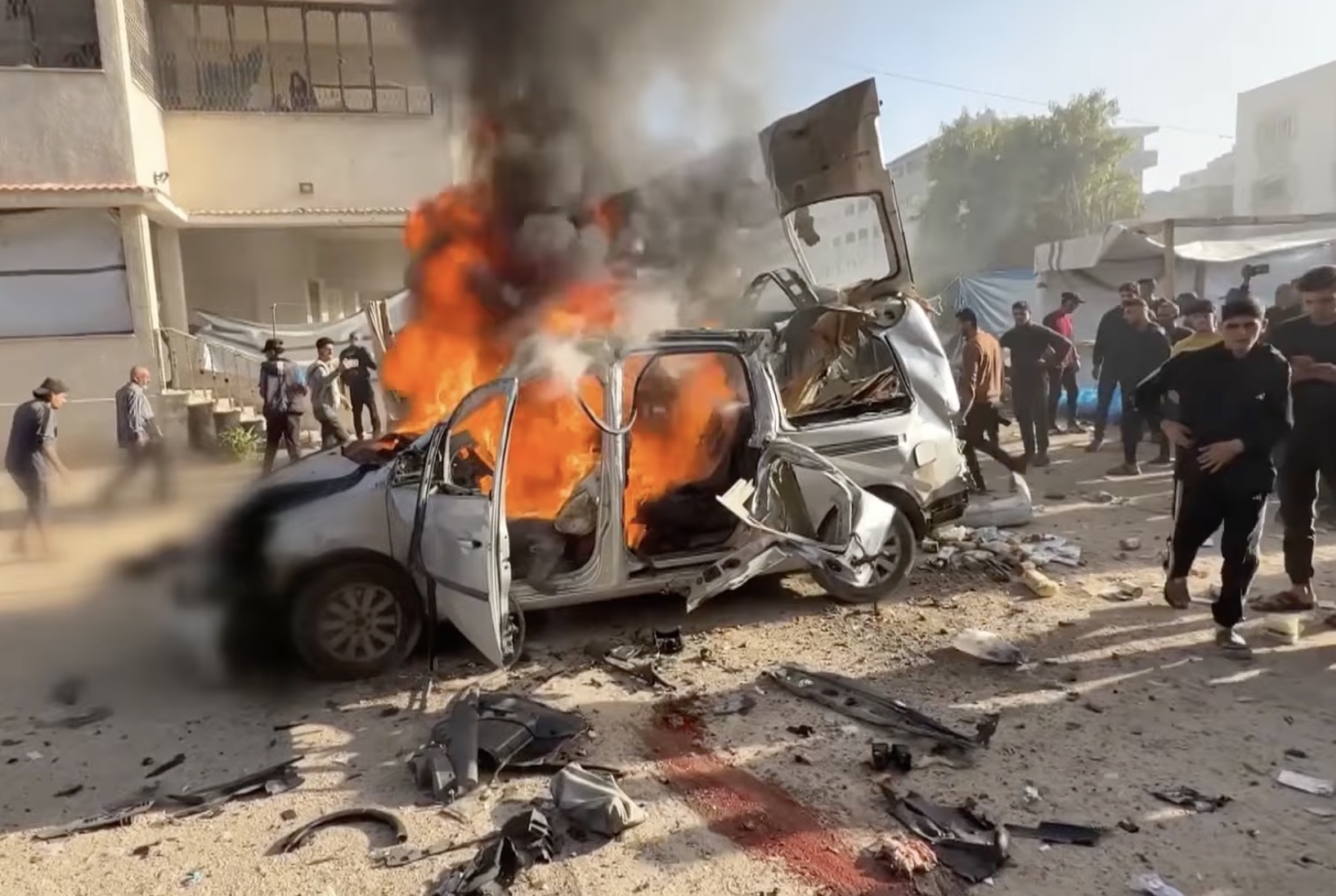 An Israeli airstrike hit a car in Gaza City Saturday, Nov. 22, 2025