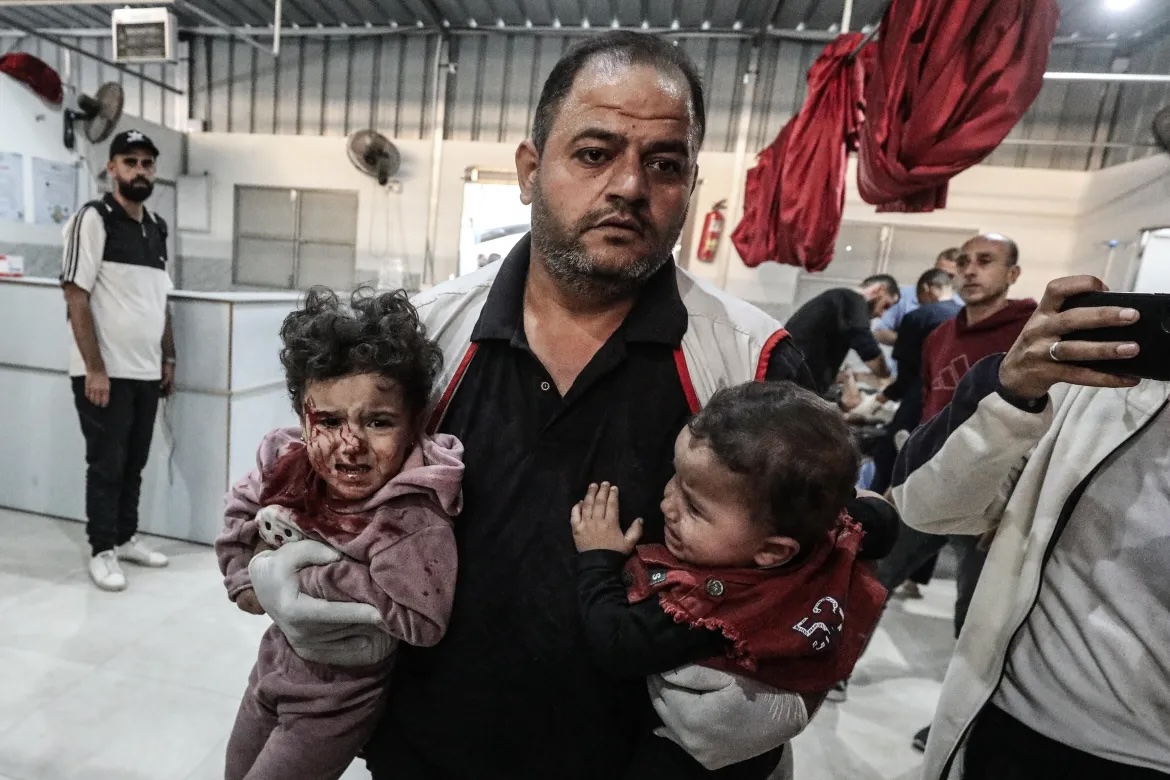 A strike targeting a house near al-Awda Hospital in central Gaza killed at least three people and wounded 11.