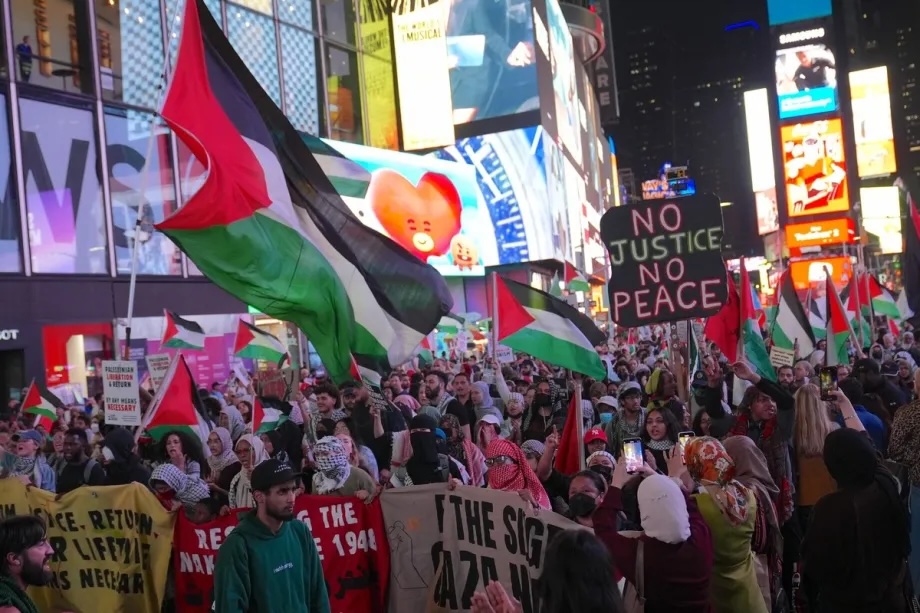 Pro-Palestine protesters attend a rally outside the News Corp headquarters, the home of Fox News and march to Hudson Yards in Manhattan, New York City, to mark two years since the outbreak of war in Gaza on October 07, 2025 in New York, United States.