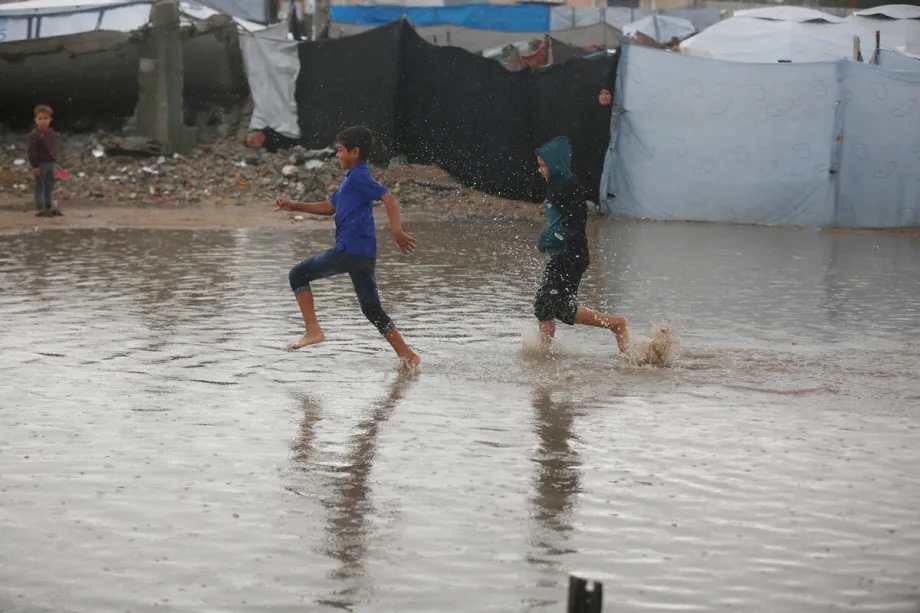 Heavy rainfall flooded many tents sheltering displaced Palestinians in Gaza Strip on November 25, 2025.