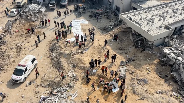 Rescue Teams Dig Up Over 50 Bodies Buried in Shallow Graves in Courtyard of Gaza City Clinic