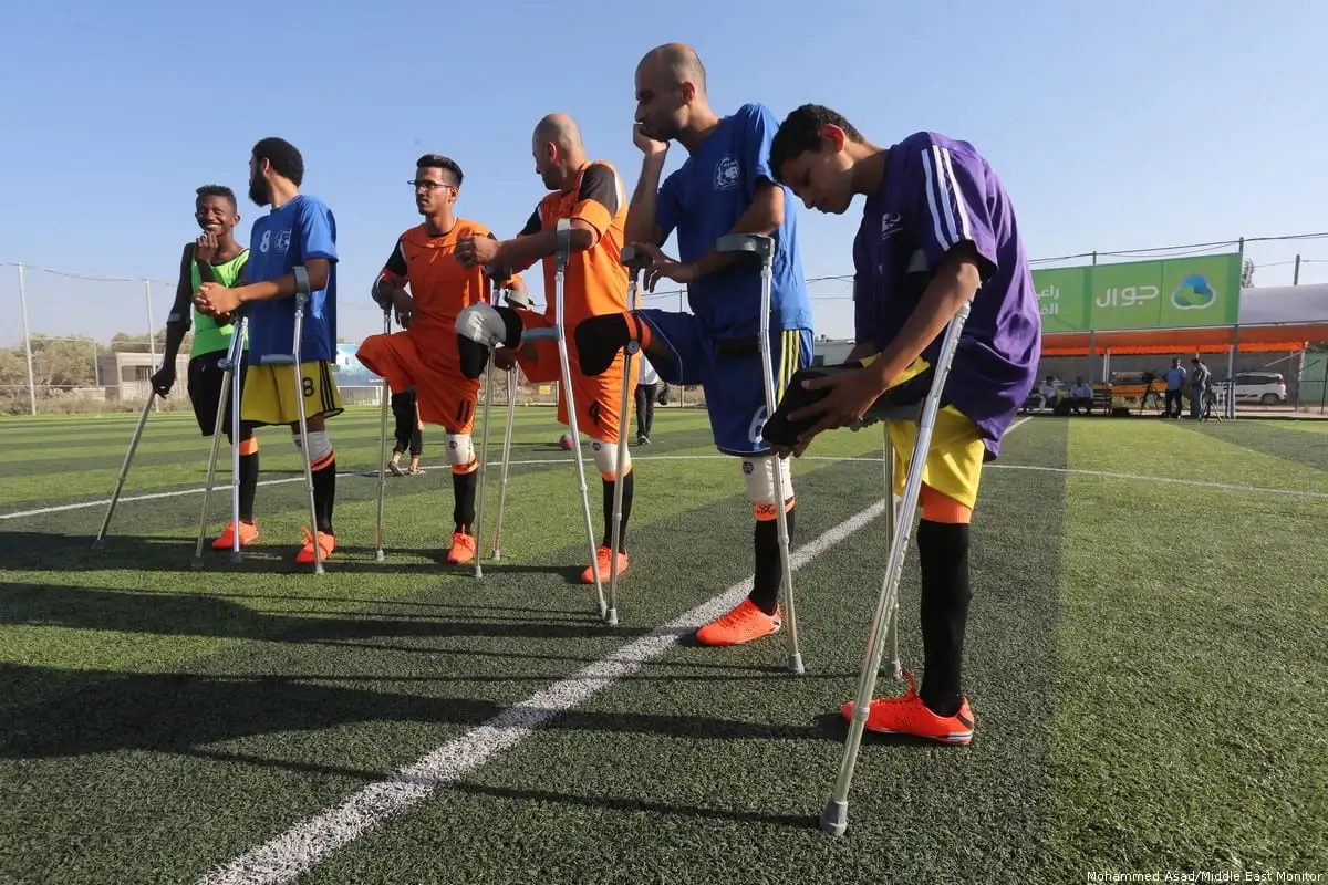 Palestinian amputees have come together to form Gaza's first football squad of people with disabilities. [Mohammad Asad/Middle East Monitor]