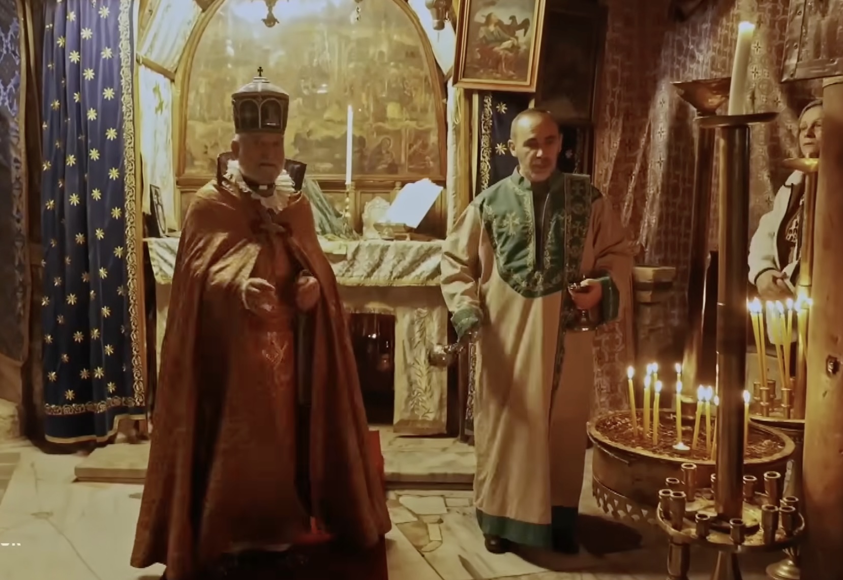 Father Asped Balion, of the Armenian Apostolic Church of Bethlehem, conducts a Christmas Eve ceremony