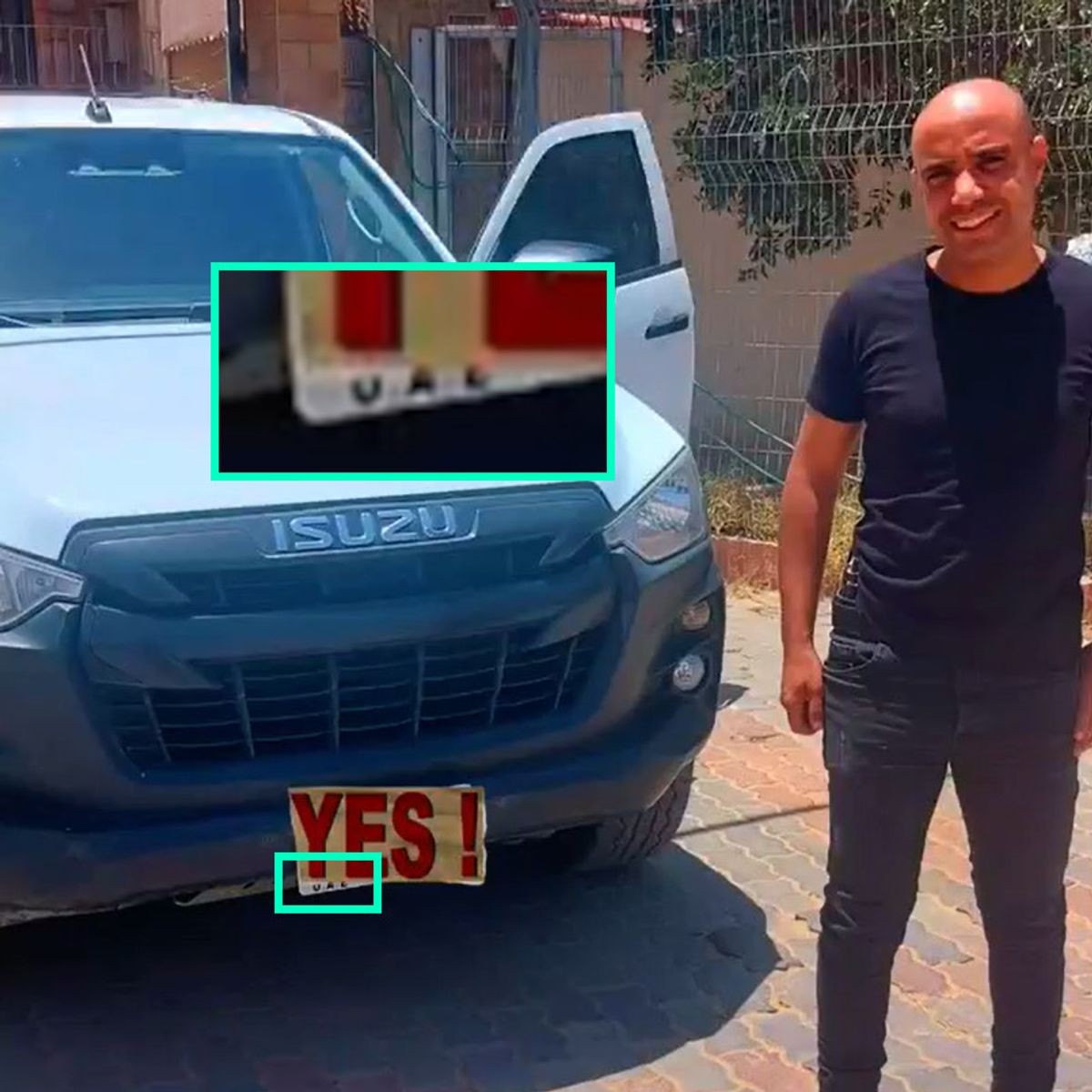 Ghassan Al Duhine poses next to a UAE-registered car in a photo shared on 15 June 2025.
