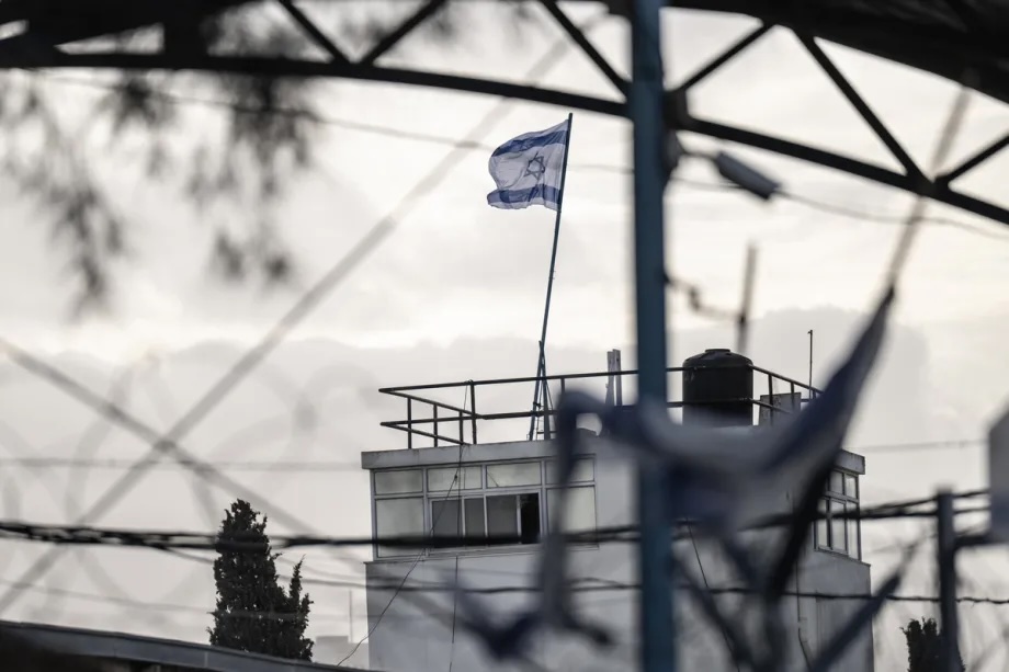 Israeli army carries out a raid, and replaces the UN flag with the Israeli flag at the UNRWA center in east Jerusalem on December 08, 2025.