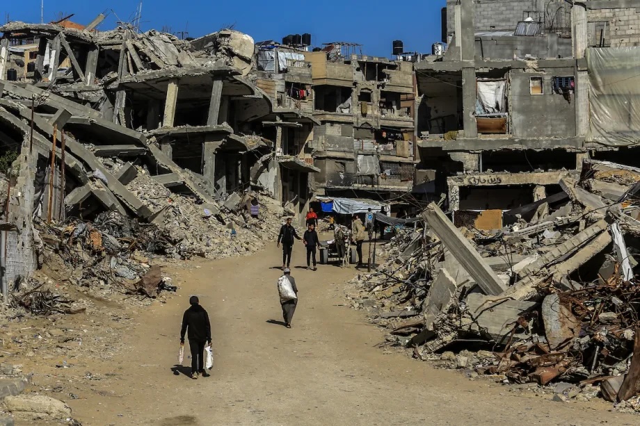 Palestinians in the city of Khan Yunis in southern Gaza are struggling to rebuild their lives amid the rubble of homes destroyed in Israeli attacks on December 07, 2025.