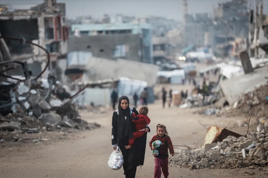 Displaced Palestinian families living in the Beit Lahia area in the northern Gaza Strip try to carry on with their daily lives under harsh conditions amid the rubble left behind by Israeli attacks on January 19, 2026.