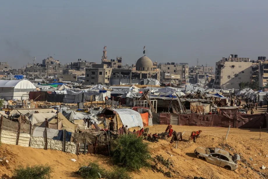 Displaced Palestinian families living in makeshift tents near the city of Rafah in the southern Gaza Strip face increasingly dire living conditions due to adverse weather and inadequate shelter, on November 17, 2025.
