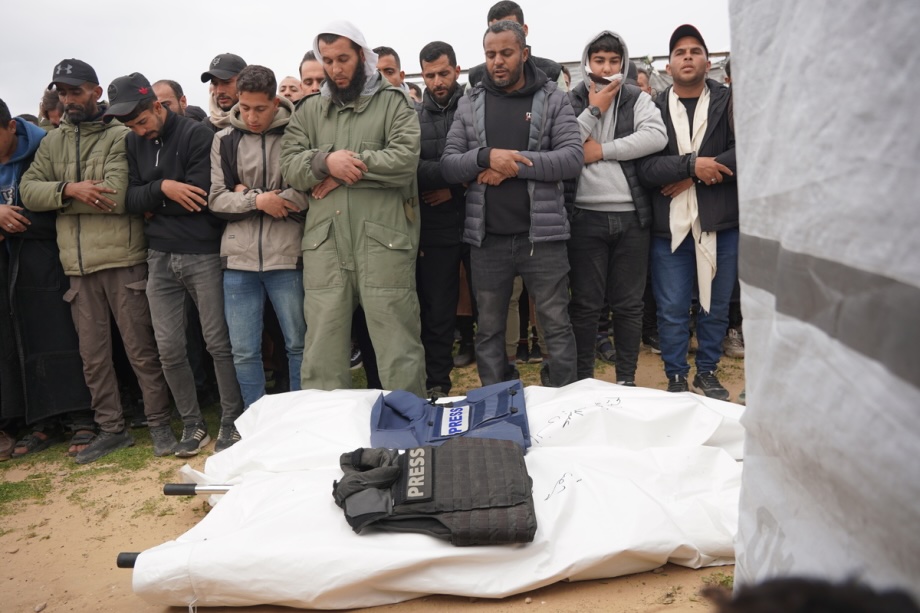 People attend the funeral of Palestinian journalists Mohammed Salah Qashta, Abdul Raouf Shaat and Anas Ghneim, killed in an Israeli attack, in Khan Younis, Gaza on January 22, 2026. 