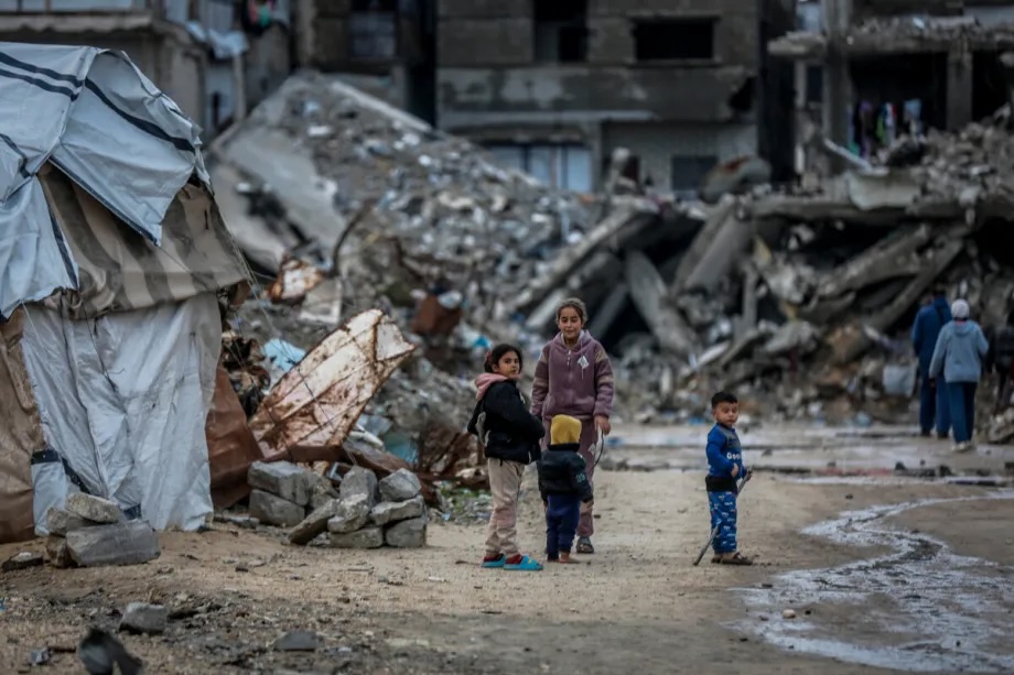 Palestinian children, whose homes were destroyed in Israeli attacks, struggle in the severe winter weather in the Sheikh Ridwan neighborhood in the northern Gaza Strip on January 2, 2026.