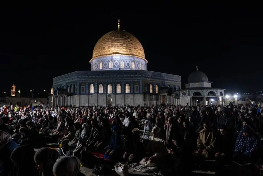 Palestinians perform the Tarawih prayer in front of the Dome of the Rock (Qubbat as-Sakhrah) in the Al-Aqsa Mosque during the Laylat al-Qadr, the 27th night of the holy month of Ramadan, despite the obstacles imposed by Israel in Jerusalem on March 26, 2025.