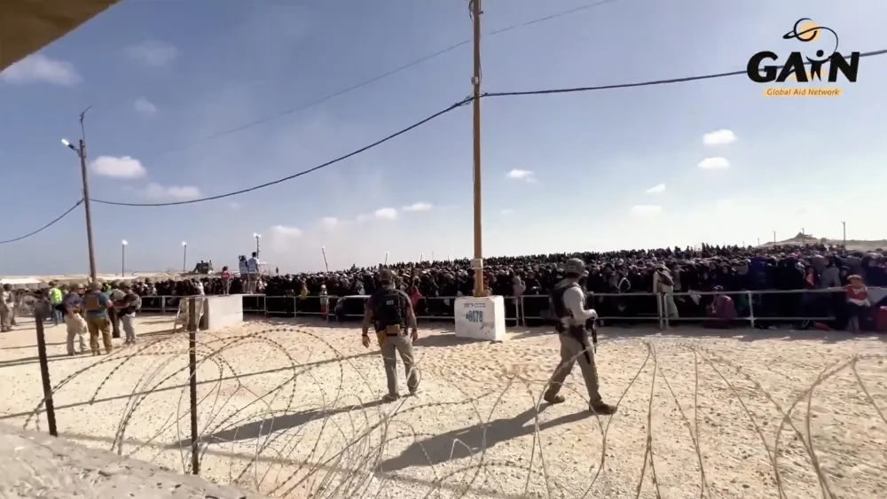 Screenshot of a video posted on Andrzej Gasiorowski's YouTube channel from a Gaza Humanitarian Foundation distribution site in 2025.
