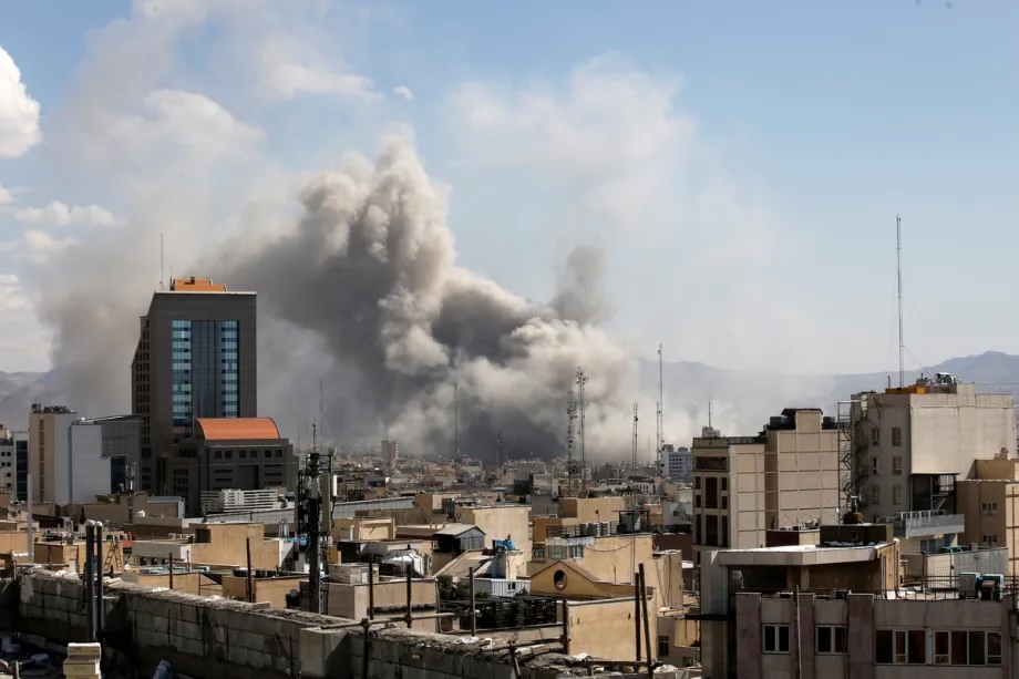 Plumes of smoke rise over the residential areas of the Iranian capital following airstrikes amid ongoing U.S.- Israeli attacks as multiple explosions are heard across the city in Tehran, Iran on March 01, 2026.