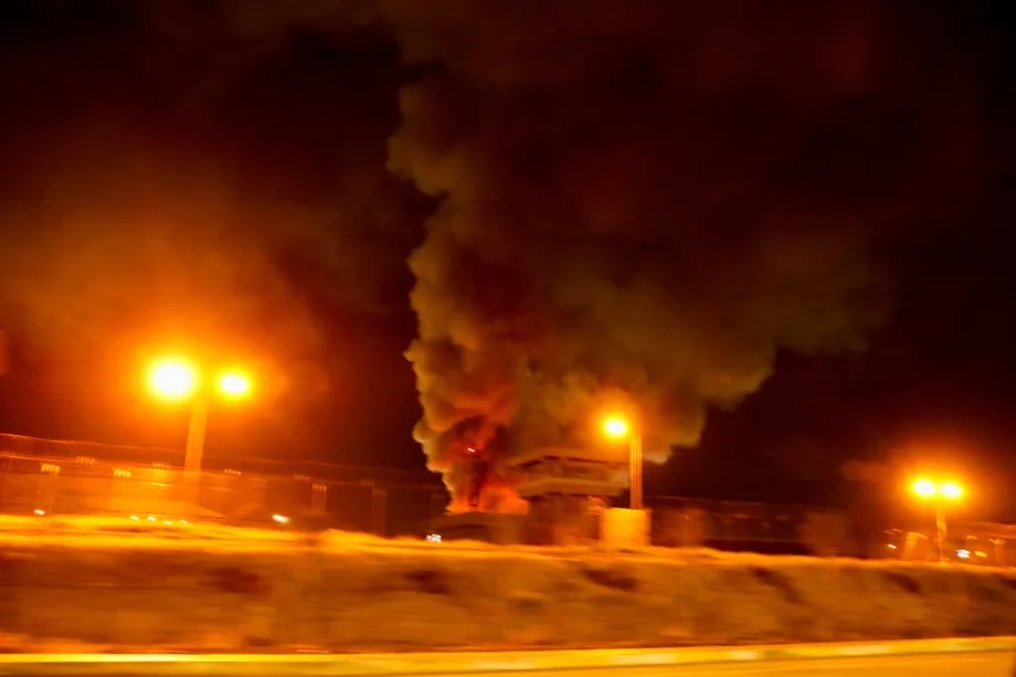 An explosion is reported near the U.S. Consulate and the Erbil International Airport area, where a U.S. military base is also located, in Erbil, Iraq, with fire breaking out and thick smoke rising following the blast, on march 12, 2026.