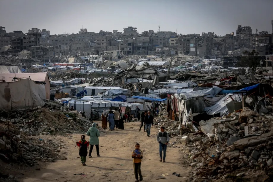 Palestinians continue their daily lives under harsh conditions amid the rubble left by Israeli attacks in the Jabalia Refugee Camp, Gaza, on March 11, 2026.