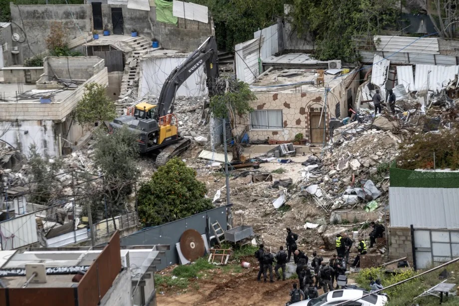 Israeli military demolishes two Palestinian-owned homes in the Silwan neighborhood of Jerusalem on March 30, 2026.
