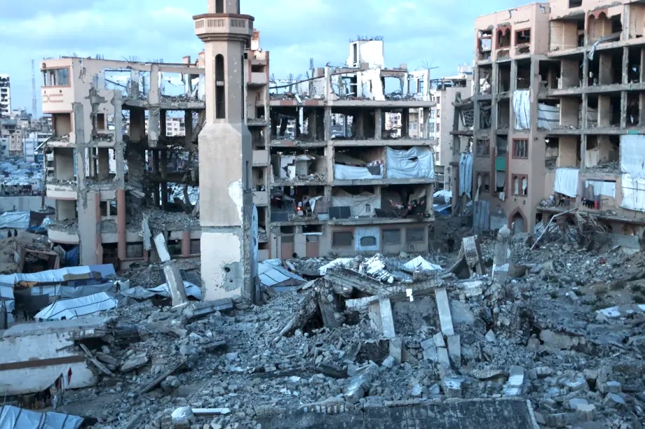 Displaced Palestinian families live in makeshift tents and damaged buildings within the campus of the Islamic University of Gaza, which was heavily destroyed by Israeli attacks, in Gaza City, Gaza, Palestine on April 12, 2026.