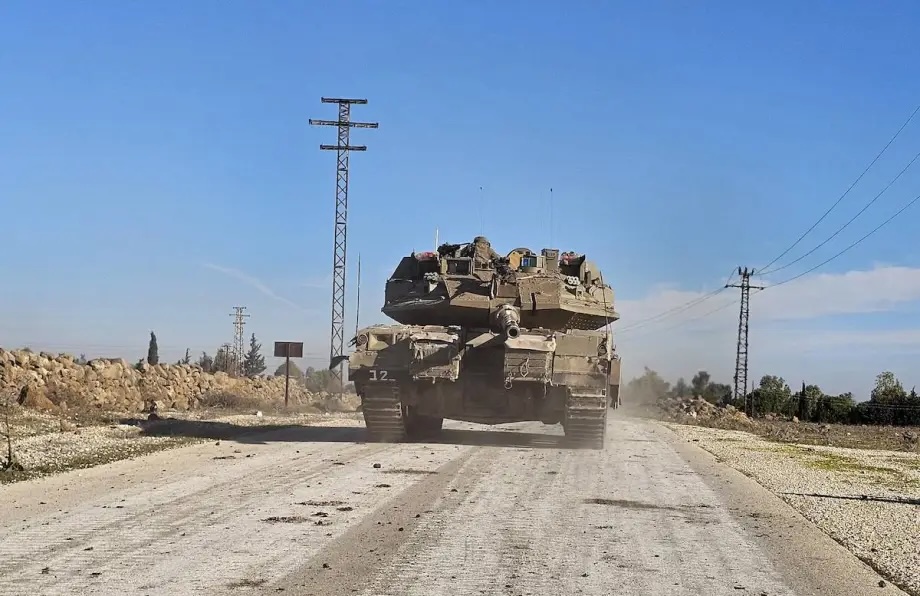Israeli army tanks leave the area after they caused damage to civilian areas in four towns of Quneitra province in the Golan Heights, following the fall of the Baath regime in Syria on January 8, 2025.