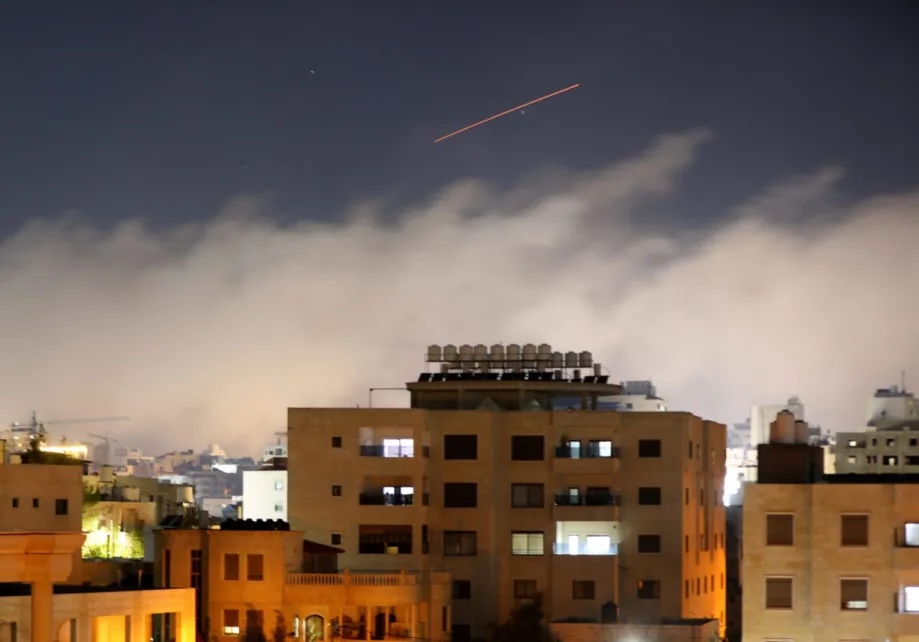 Missiles launched by Iran in retaliation for U.S. and Israeli attacks are seen in the skies over Hebron, West Bank, Palestine, on March 30, 2026.