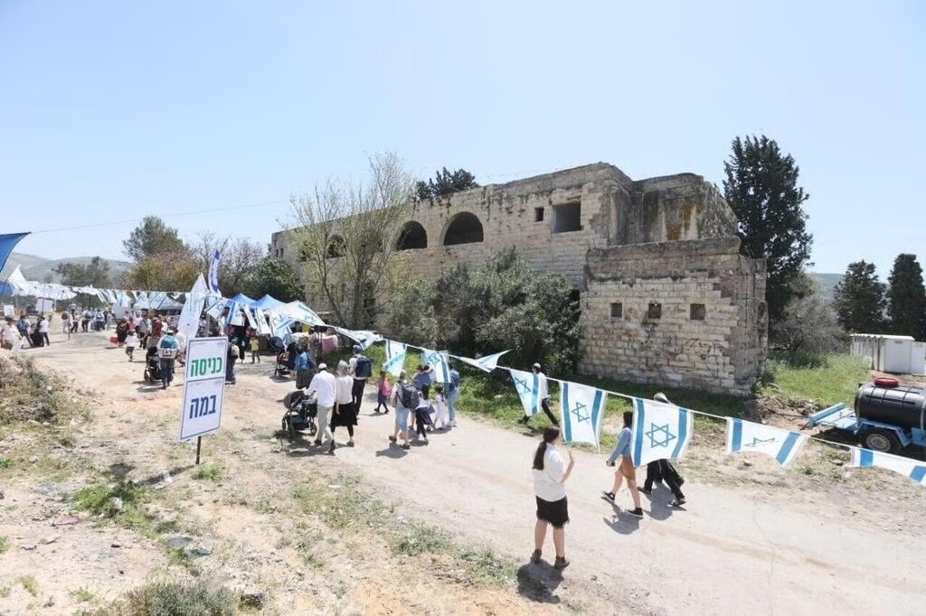 A march and gathering at the site of the evacuated Ganim settlement in the northern West Bank, April 2026. 
