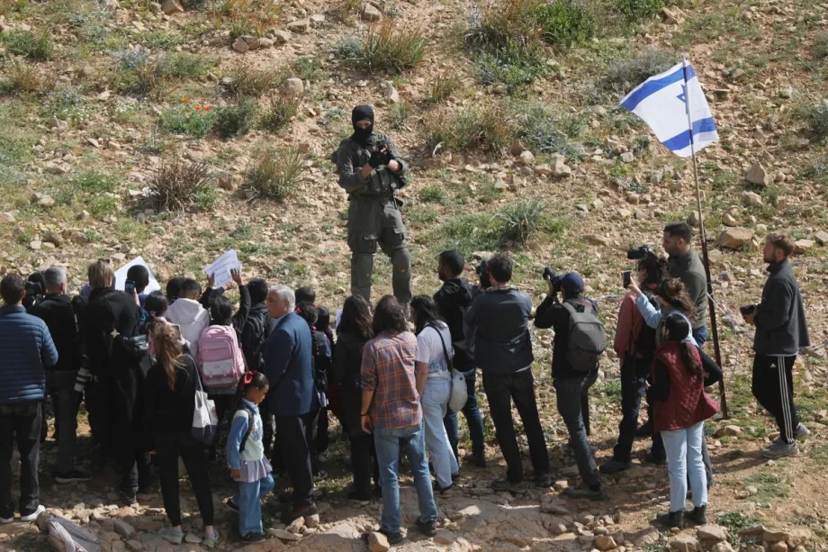 Israeli security forces take measures against protesters who are demonstrating about Israeli settlers blocking students from walking to school in the village of Umm al-Kheir in the Masafer Yatta region of Hebron, West Bank, Palestine on April 19, 2026.