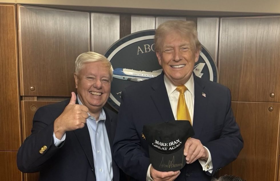 President Trump holds a ‘Make Iran Great Again’ hat in a photo posted to Sen. Graham’s X account on January 5, 2026
