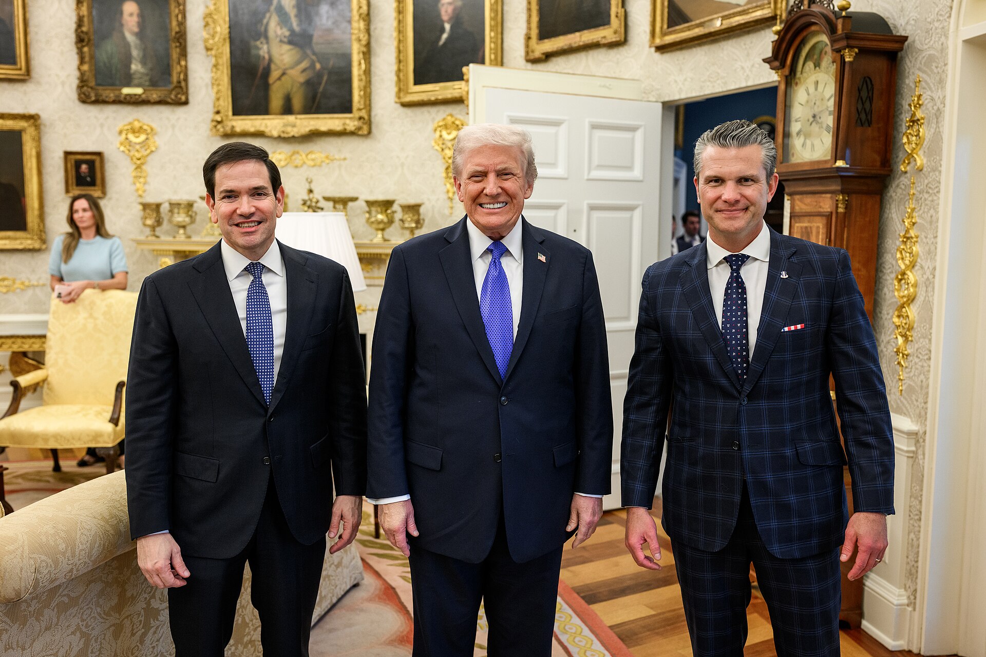 President Donald Trump poses for a portrait with Secretary of State Marco Rubio and Secretary of War Pete Hegseth in the Oval Office, Wednesday, October 22, 2025.
