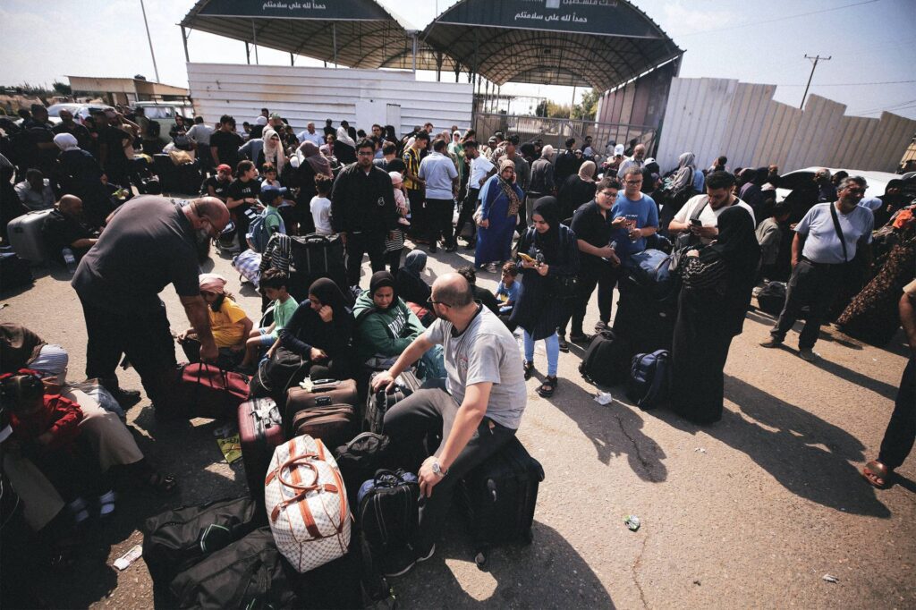 Palestinians wait at the Rafah crossing, Gaza, October 16th, 2023.