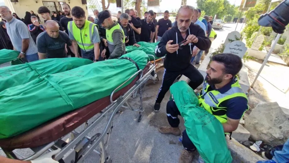 Relatives mourn during the funeral ceremony held for seven people, including a child, who were killed in an Israeli strike targeting the town of Al-Saksakiyyeh in Sidon, Lebanon on May 10, 2026.