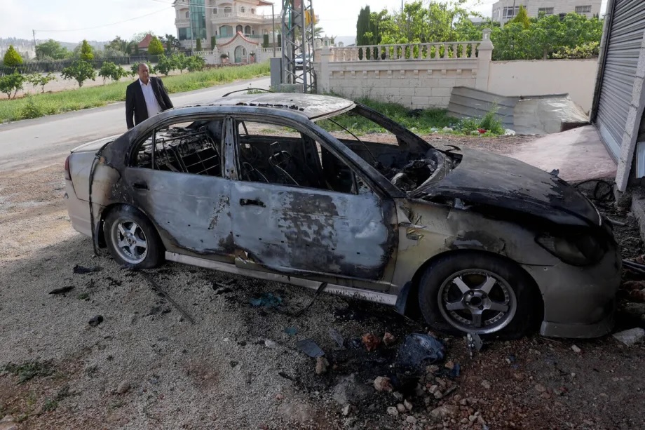 A Palestinian man checks the damage after Israeli settlers raided the town of Turmus Ayya of Ramallah, West Bank, Palestine on April 19, 2026.