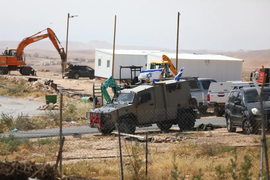 Prefabricated houses installed by illegal Israeli settlers are seen under the protection of the Israeli army in the village of Umm al-Khair, located in the Masafer Yatta region south of Hebron in West Bank, Palestine on May 20, 2026.