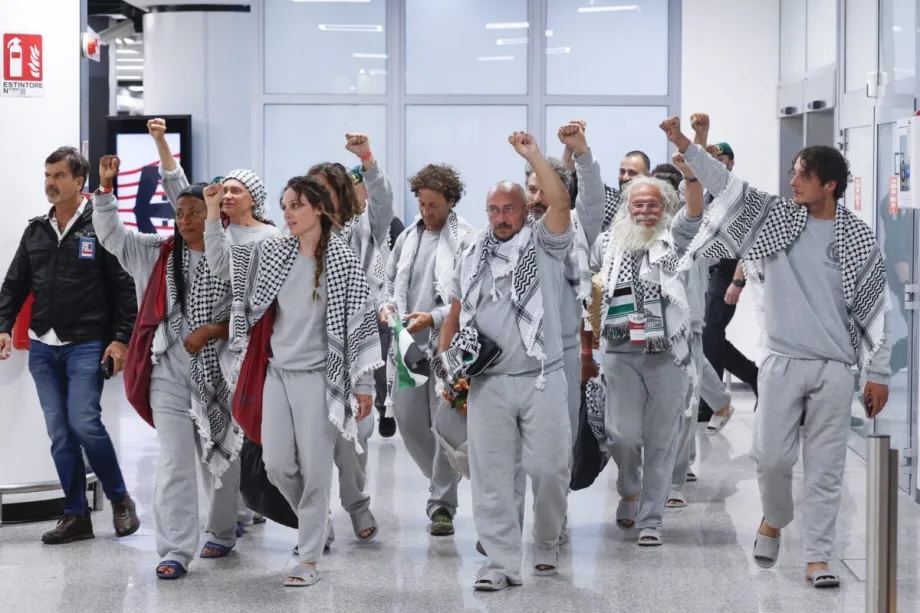 Activists of the Global Sumud Flotilla wearing Israeli prison uniforms arrive from Istanbul, Turkiye, at Rome’s Fiumicino international airport, Italy, on May 21, 2026.