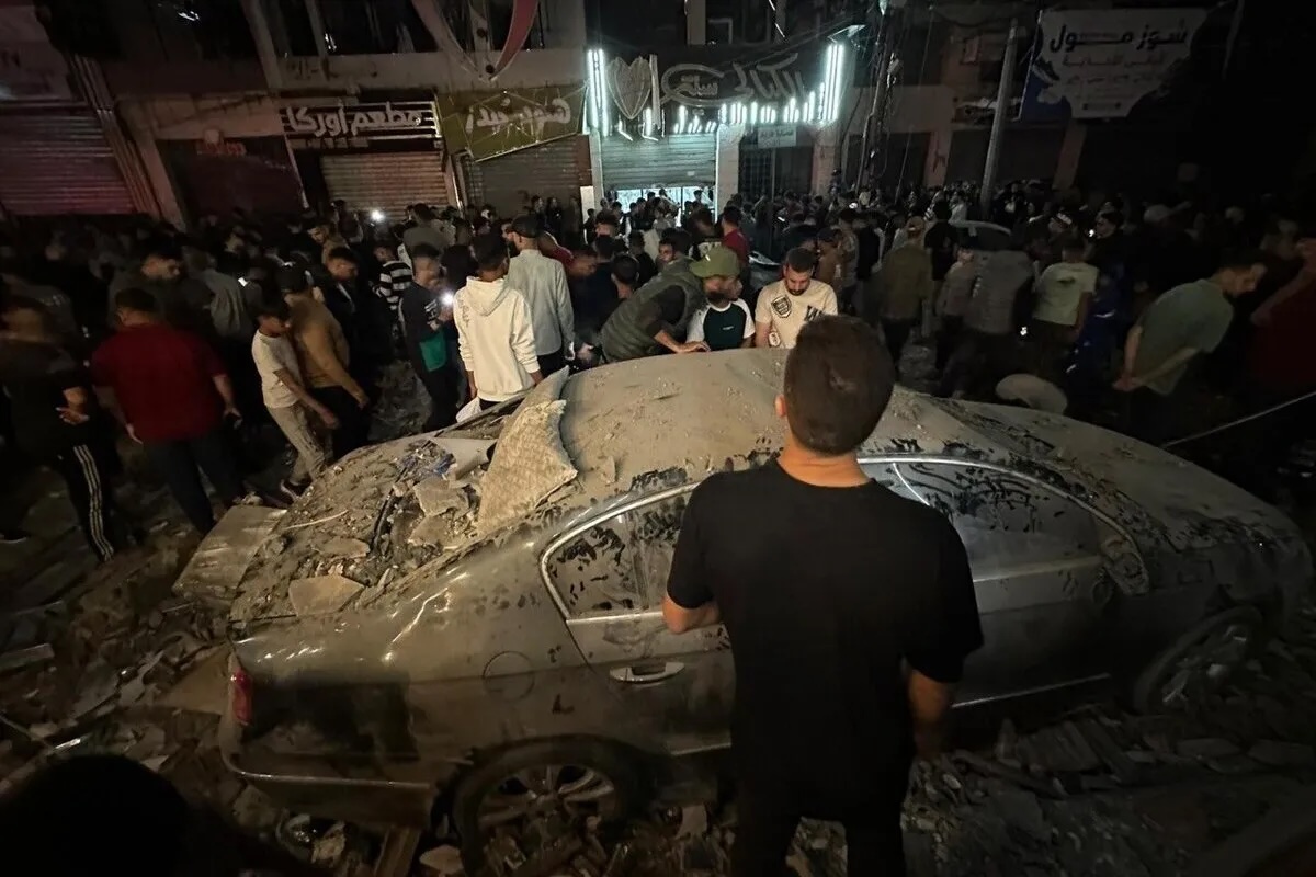 Palestinian residents inspect a severely damaged apartment building following an Israeli airstrike in the western Rimal neighborhood of Gaza City, Gaza, Palestine on May 26, 2026.