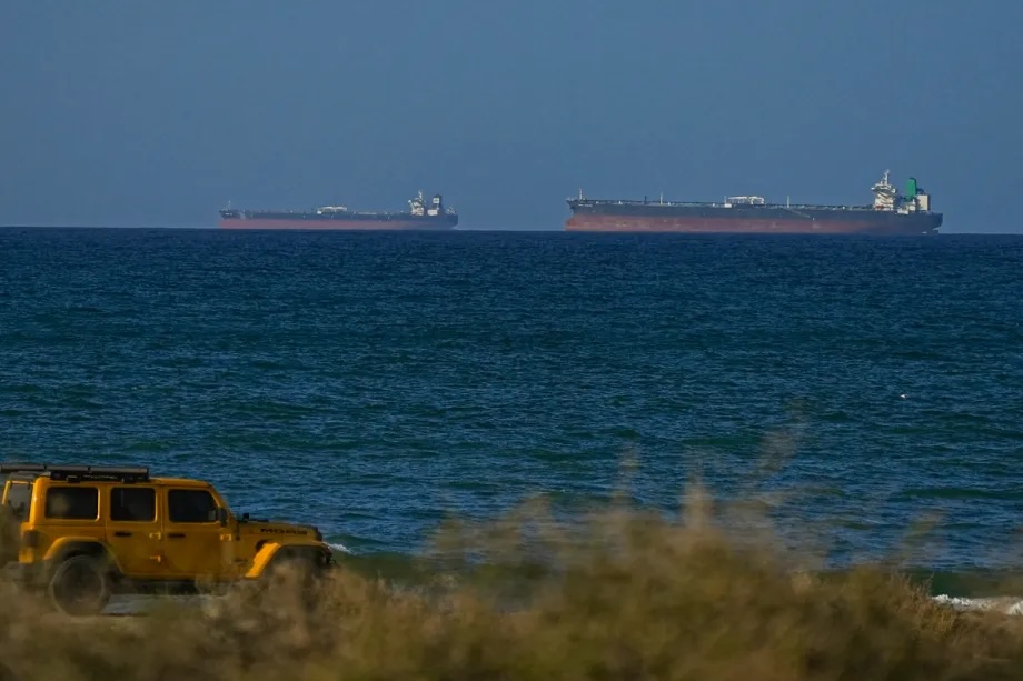 A view of the vessels passing through Strait of Hormuz following the two-week temporary ceasefire reached between the United States and Iran on the condition that the strait be reopened, seen in Oman on April 08, 2026.