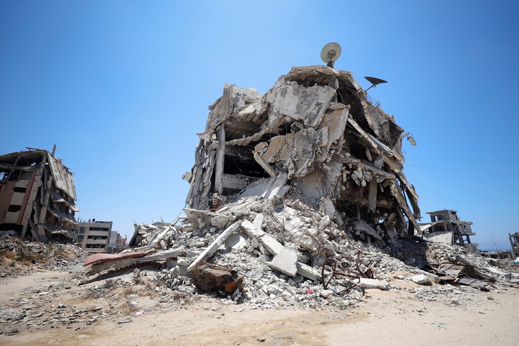 Scenes from Gaza's Shati Refugee Camp: displaced by ongoing Israeli attacks, Palestinians live with limited resources among the debris of buildings destroyed in the attacks.